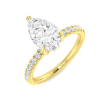 Pear Cut Diamond Engagement Ring with Pavé Band in Gold