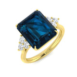 Emerald Cut London Blue Topaz Ring with Diamonds in Yellow Gold
