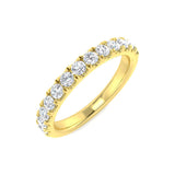 Gold ring with diamonds on a white background