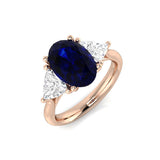 Oval Sapphire Three Stone Ring with Trillion Side Stone Diamonds | Trilogy Design Ring