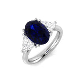 Oval Sapphire Three Stone Ring with Trillion Side Stone Diamonds | Trilogy Design Ring