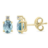 Stud Earrings with Aquamarine Oval Solitaire and Diamond
