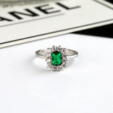 1.50 Carat Emerald and Natural Diamond Cluster Ring