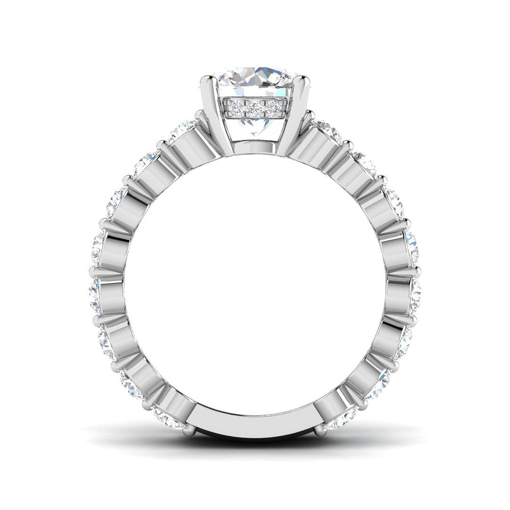 White gold statement ring with round centre diamond and layered band