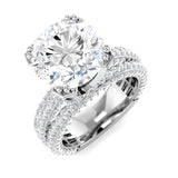 Diamond ring with intricate design on a white background