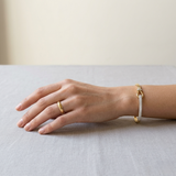 9K Yellow Gold Natural Round Cut Pave Set Knot Design Diamond Bangle with Hinged Lock