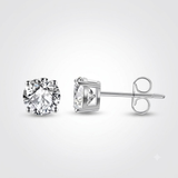 Gold stud earrings featuring round solitaire diamonds for her.