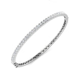Bracelet de tennis de luxe en or et platine, serti de diamants ronds.