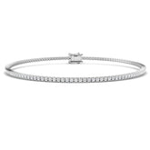 Bracelet de tennis de luxe en or et platine, serti de diamants ronds.