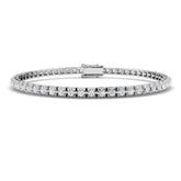 Bracelet de tennis de luxe en or et platine, serti de diamants ronds.