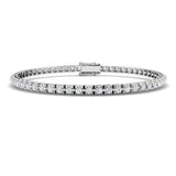 Bracelet de tennis de luxe en or et platine, serti de diamants ronds.