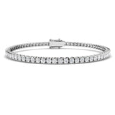 Bracelet de tennis de luxe en or et platine, serti de diamants ronds.