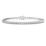Bracelet de tennis de luxe en or et platine, serti de diamants ronds.