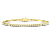 Bracelet de tennis de luxe en or et platine, serti de diamants ronds.