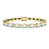 Prong Set Oval Cut Opal Gemstone and Natural Diamond Tennis Bracelet in Solid Gold