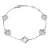 Bracelet de tennis de luxe en or et platine, serti de diamants ronds.