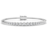 Bracelet de tennis de luxe en or et platine, serti de diamants ronds.