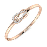 Bracelet de tennis de luxe en or et platine, serti de diamants ronds.