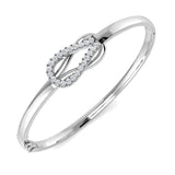 Bracelet de tennis de luxe en or et platine, serti de diamants ronds.
