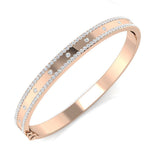 Bracelet de tennis de luxe en or et platine, serti de diamants ronds.
