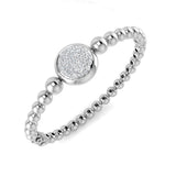 Bracelet de tennis de luxe en or et platine, serti de diamants ronds.