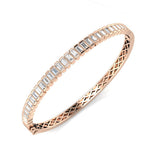 Bracelet de tennis de luxe en or et platine, serti de diamants ronds.