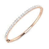 Bracelet de tennis de luxe en or et platine, serti de diamants ronds.