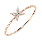 Bracelet de tennis de luxe en or et platine, serti de diamants ronds.