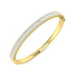 Bracelet de tennis de luxe en or et platine, serti de diamants ronds.