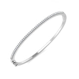 Bracelet de tennis de luxe en or et platine, serti de diamants ronds.