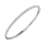 Bracelet de tennis de luxe en or et platine, serti de diamants ronds.