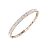 Bracelet de tennis de luxe en or et platine, serti de diamants ronds.