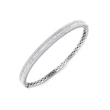 Bracelet de tennis de luxe en or et platine, serti de diamants ronds.
