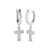 Silver hoop earrings with cross pendants on a white background