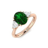 Oval Cut Emerald Engagement Ring with Side Diamonds