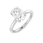 Oval cut diamond solitaire engagement ring in white gold with classic prong setting.
