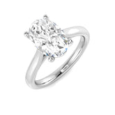Oval cut diamond solitaire engagement ring in white gold with classic prong setting.
