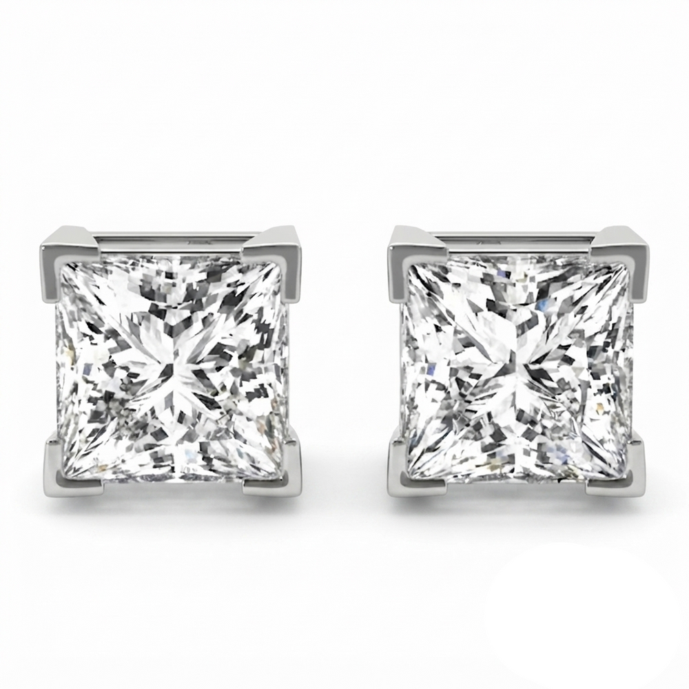 A pair of princess-cut diamond stud earrings
