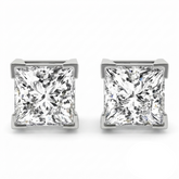 A pair of princess-cut diamond stud earrings