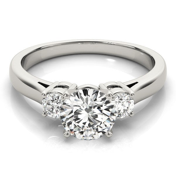 Diamond ring with three heart-shaped diamonds on a white background