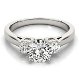 Diamond ring with three heart-shaped diamonds on a white background