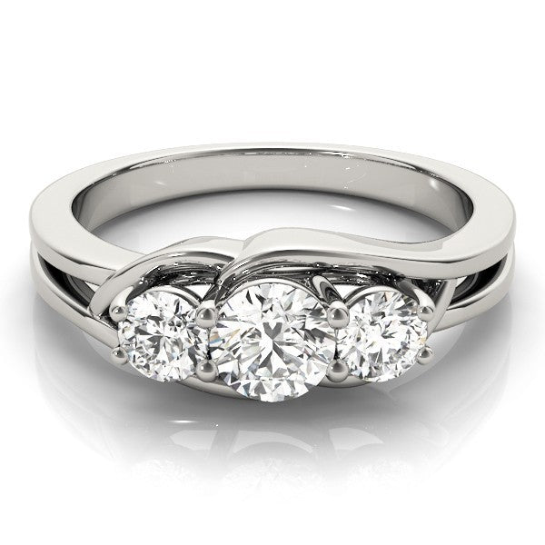 Silver ring with three diamonds on a white background