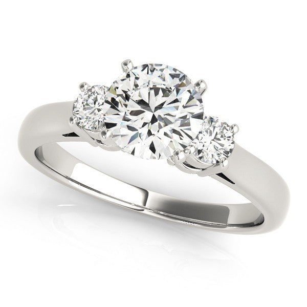Diamond ring with three clear gemstones on a white background