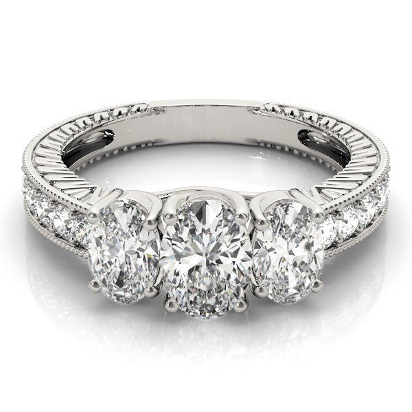 Diamond ring with a white gold band on a white background