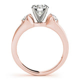 Rose gold ring with a diamond on a white background