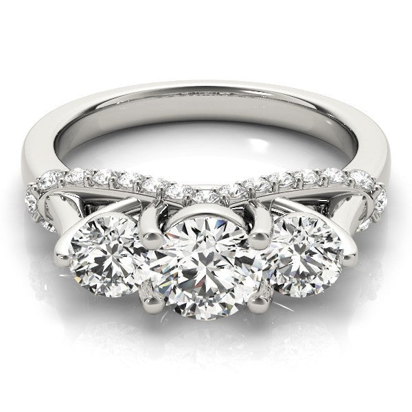 Diamond ring with three circular diamonds on a white background