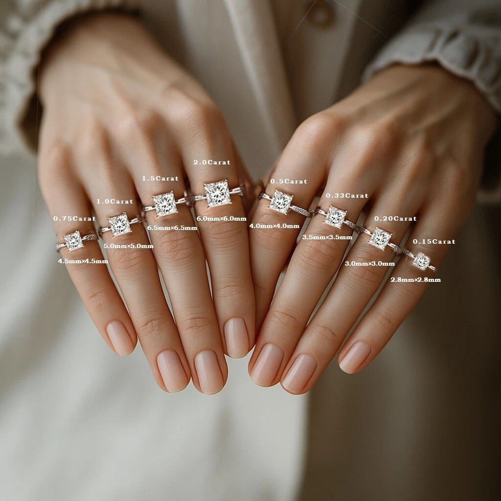 Set of diamond rings on fingers with carat weight labels