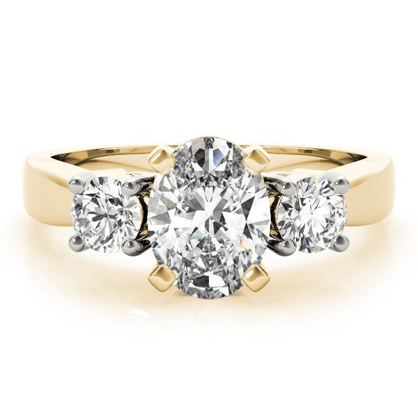 Gold ring with three diamonds on a white background