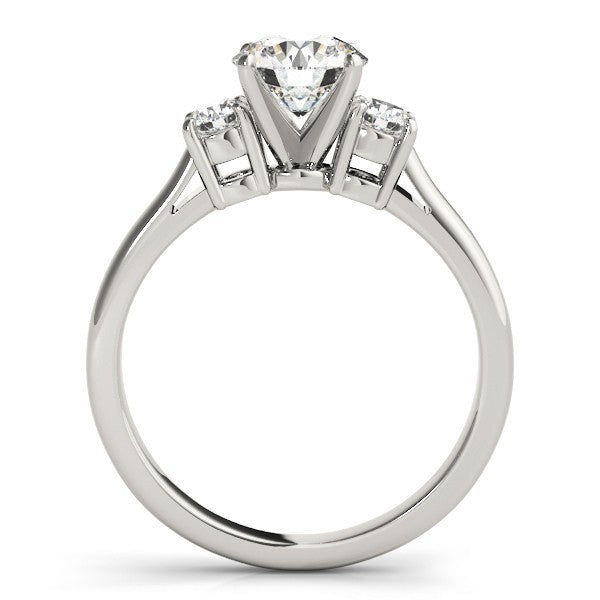 Diamond ring with three gemstones on a white background