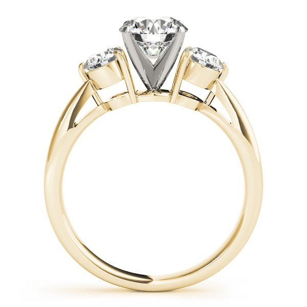Gold ring with three diamonds on a white background